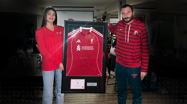 EC Markets Presents a Signed Liverpool FC Jersey to the Limassol Reds